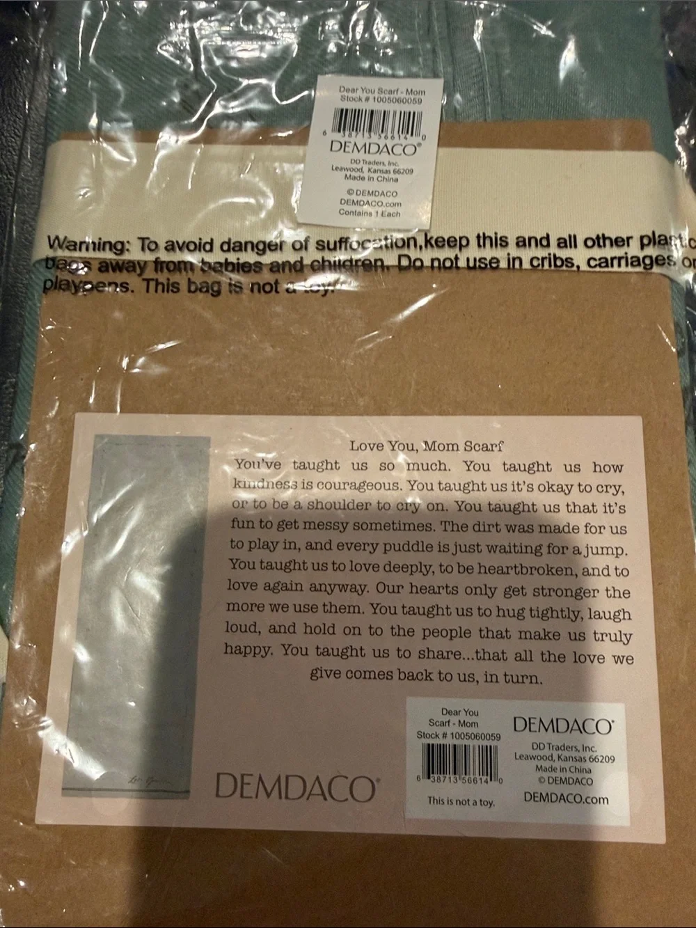 Demdaco Blue Green and Cream Bow Accent Scarf Wrap